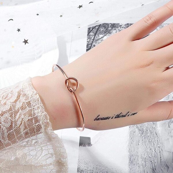 Single Knotted Tie Promise Open Cuff Bangle in Rose Gold Layered Steel Jewellery - Image 3