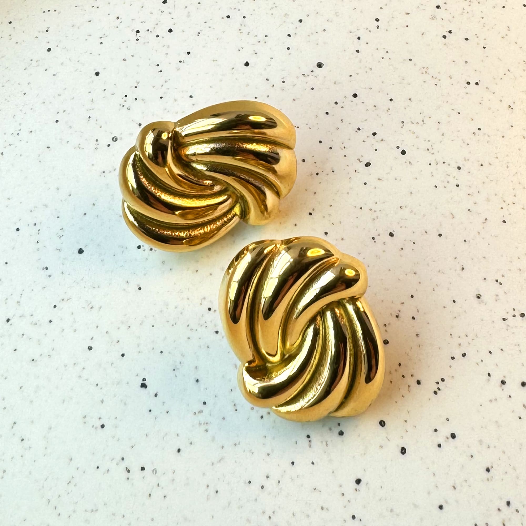 Intertwined Gold layered Stud Earrings - Image 3
