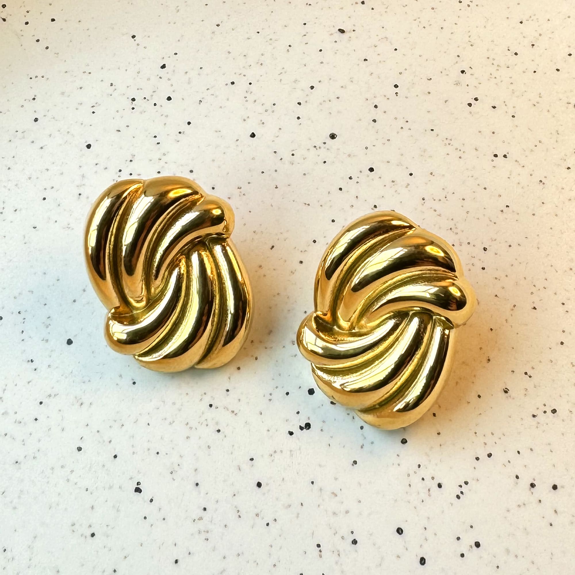 Intertwined Gold layered Stud Earrings - Image 4