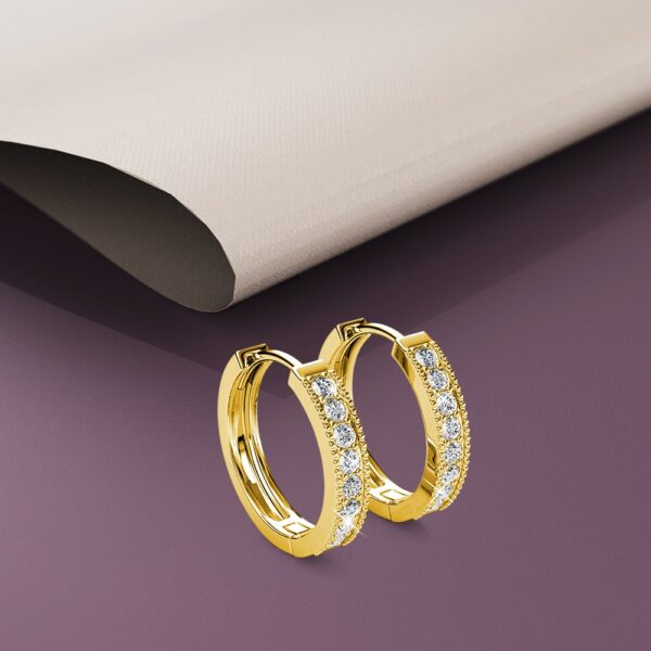 Clique Huggie Earrings Embellished with Crystals from SWAROVSKI® in Gold - Image 4